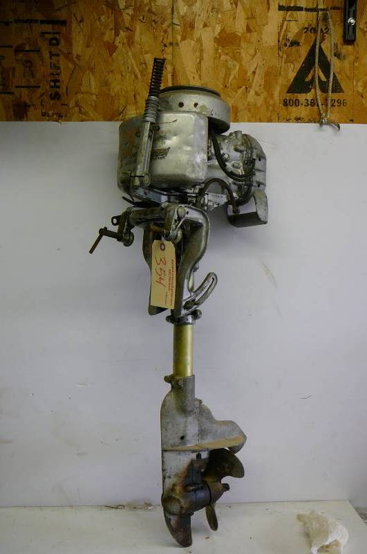 lot 354 image: Vintage Johnson seahorse out board motor model AT-10