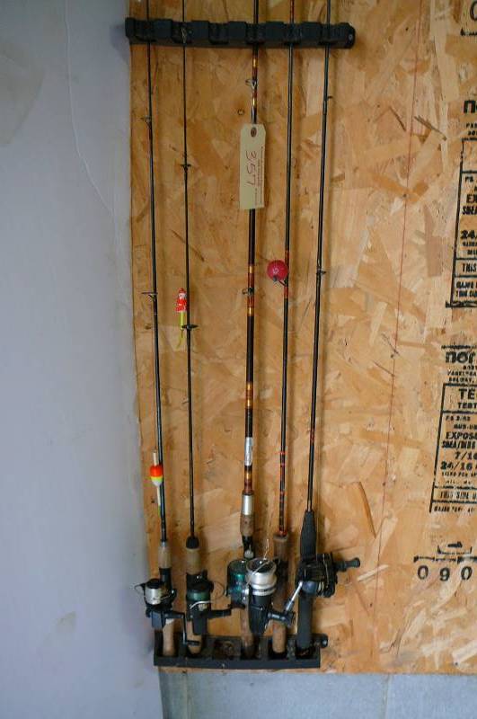 lot 357 image: 5 Fishing rods and reels, Traclite rod and reel, Intruder rod and reel, Heddon rod and reel, Skyline rod and reel, Berkley rod and reel