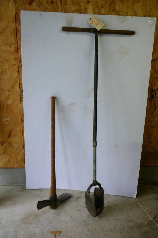 lot 379 image: Twist post hole digger, grub ax