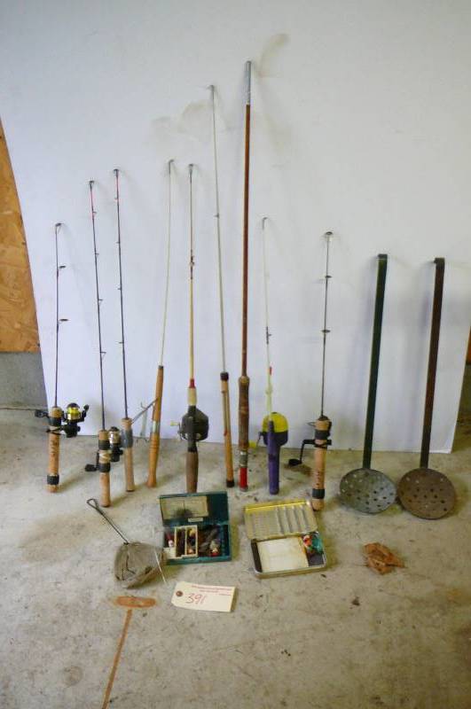 lot 391 image: Ice fishing rods, Ice scoops, Misc. jigs with fish cleaning board
