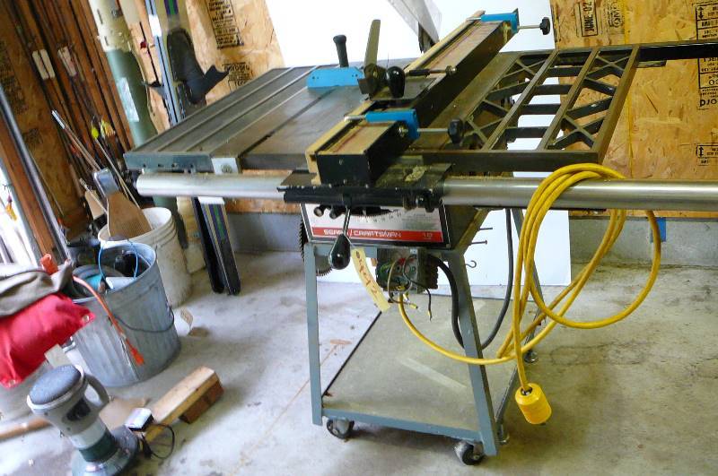 lot 442 image: Craftsman 10 table saw with Franklin electric motor Model 110-4251403 1 12h with table stand on casters