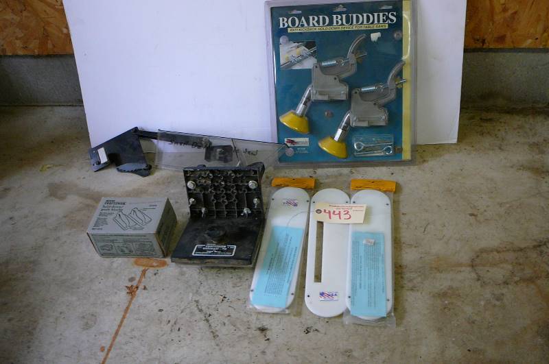 lot 443 image: Table saw attachments doard buddies New in box, blade shield, Craftsman hold down push blocks, craftsmen universal jig, 3 new zero clearance insert for old craftsman 14 38x 3 34 coping saw, combination square