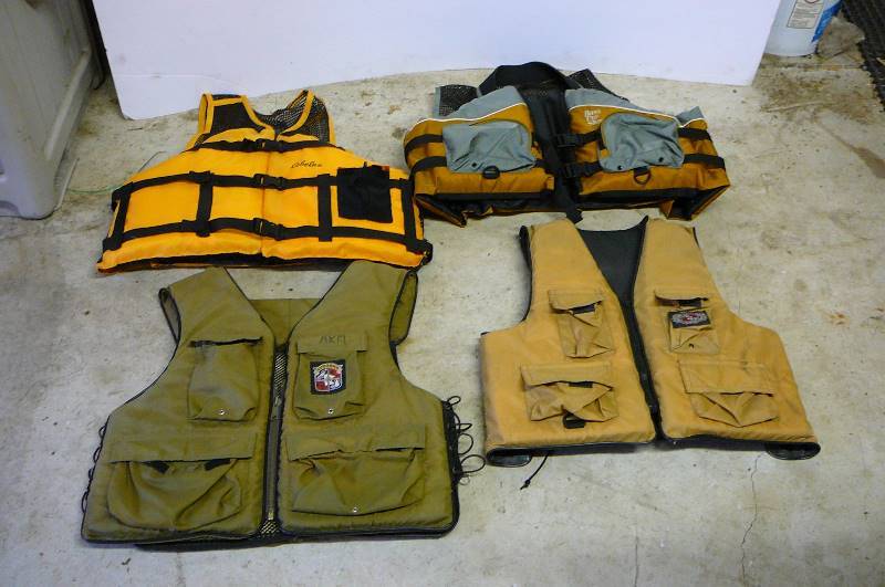 lot 466 image: 2 Sterns Life Jackets XL, Cabelas XXL Bass Pro
