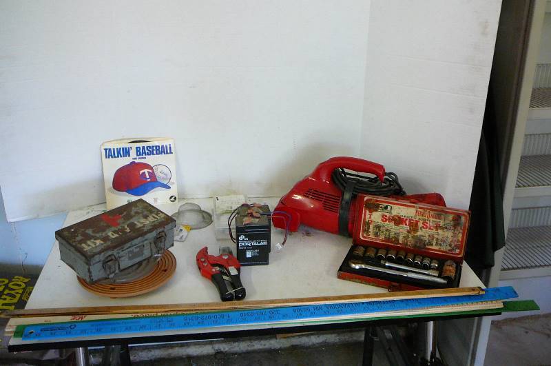 lot 588 image: Dirt devil ultra hand vacuum, socket set, first aid kit, fuses, Plastic pipe cutter, Talking baseball twins vinyl record