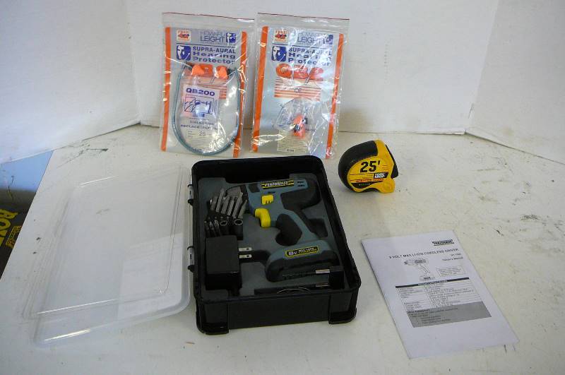 lot 589 image: New Performax cordless driver with charger,tape measure, Hearing protector