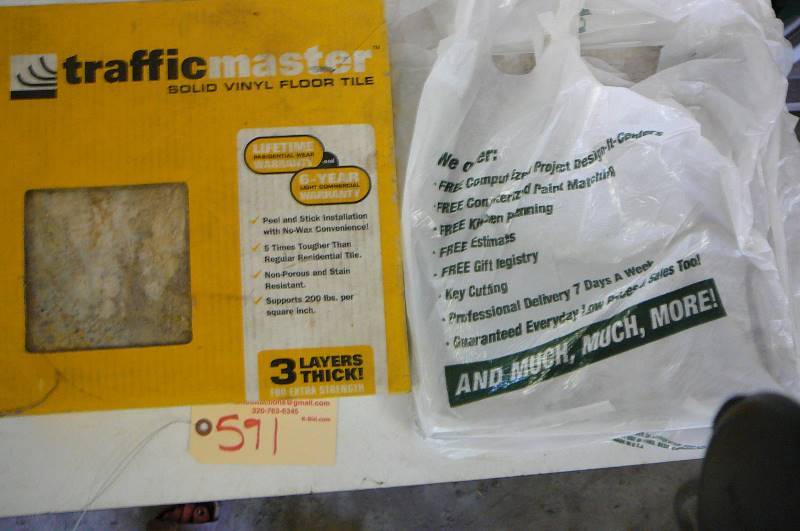 lot 591 image: Full box of traffic master 3 Layer thick solid vinyl floor tile  2 bleacher seats