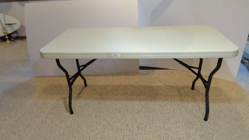 lot 716 image: Plastic Folding Table