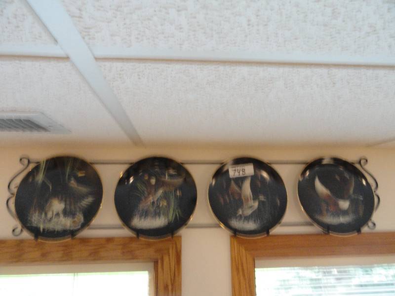 lot 748 image: Lot of Duck decorative plates with metal rack included
