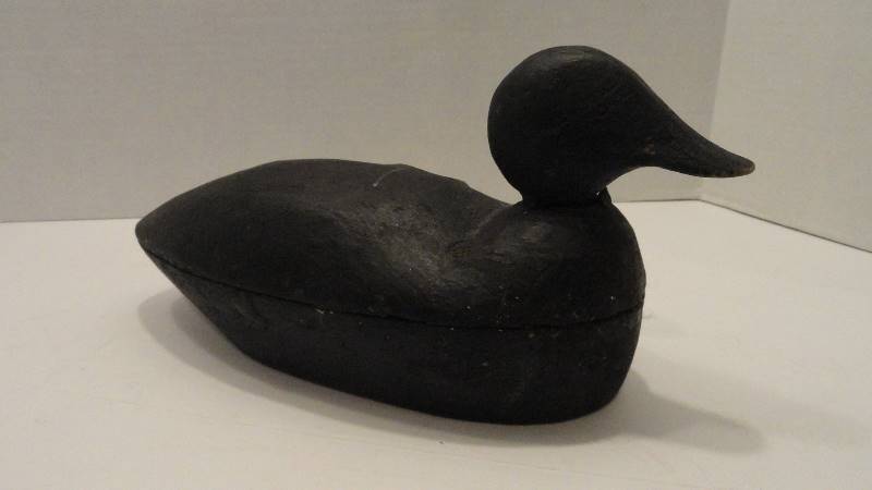 lot 774 image: Black wooden duck