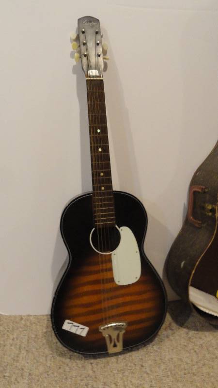 lot 777 image: Kingston guitar, picks and case