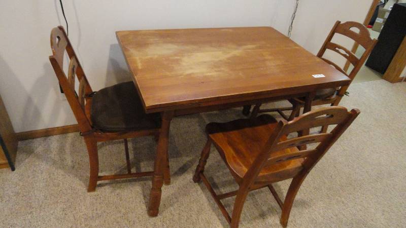 lot 770 image: Wood table with 3 wood chairs