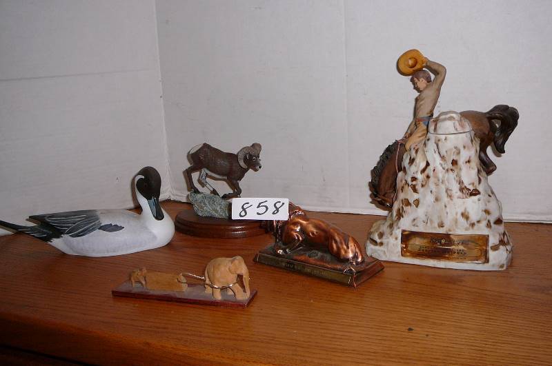 lot 858 image: Wild life home decor, Ski Country decanter cowboy statue limited edition 1978