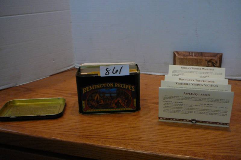 lot 861 image: Remington Recipes tin for wild life