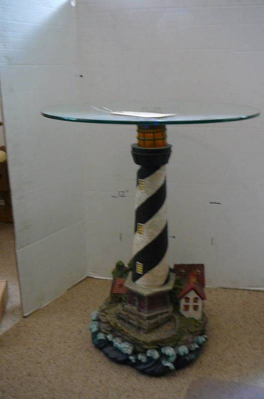 lot 903 image: Light house glass top table