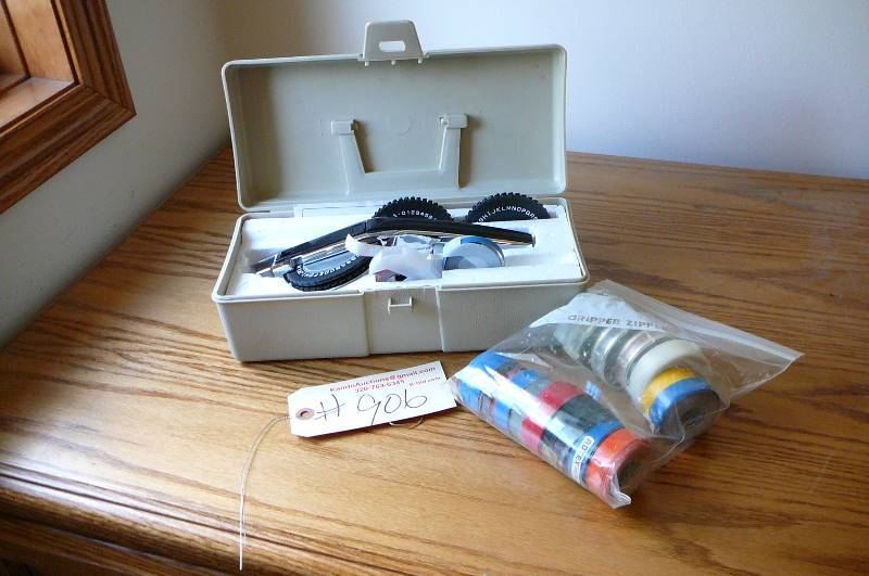 lot 906 image: Labeler with  tape