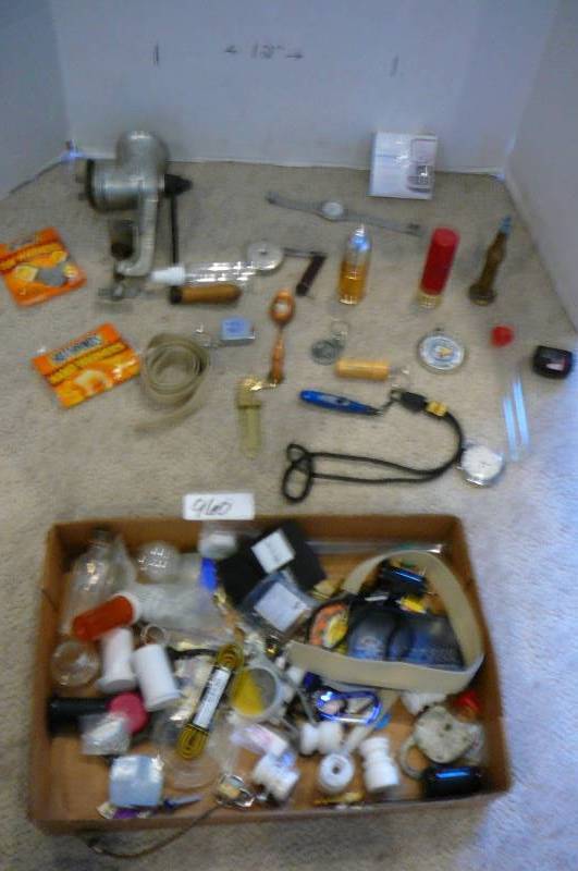 lot 960 image: Weightwatchers calculator, pocket watch, vintage insulators, Safeco Schwans vintage watch, vintage meat grinder