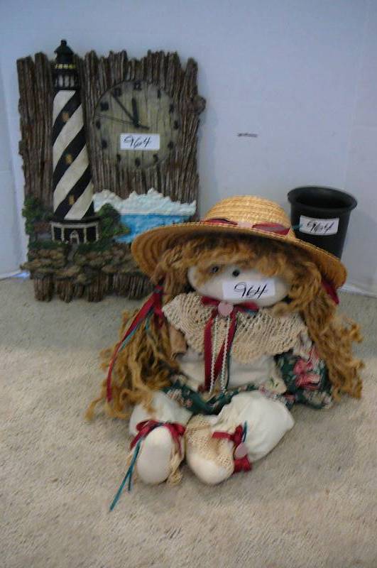lot 964 image: Light house hanging clock, doll, vase