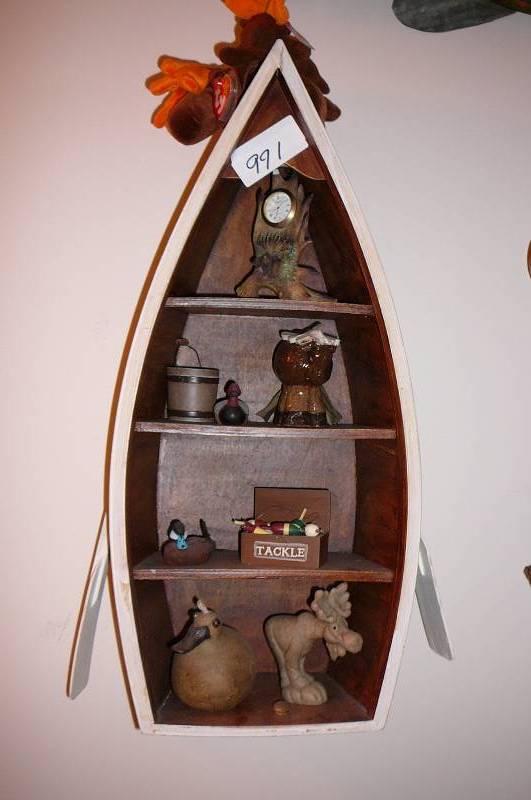 lot 991 image: Wall hanging decorative canoe with knickknacks