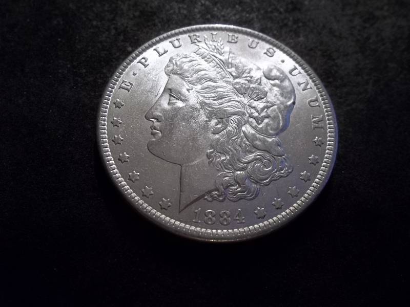 lot 16 image: 1884  Morgan Silver Dollar