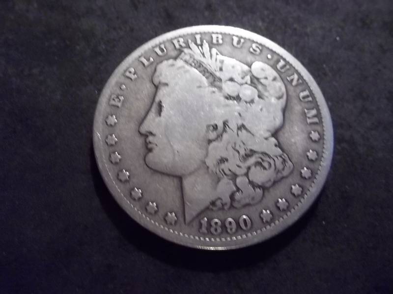 lot 28 image: 1890 O  Morgan Silver Dollar