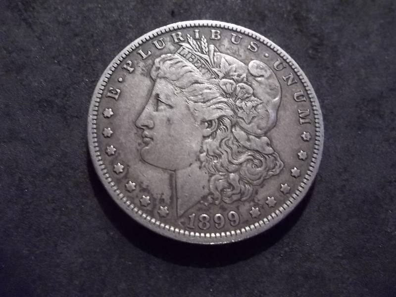 lot 39 image: 1899 O Morgan Silver Dollar