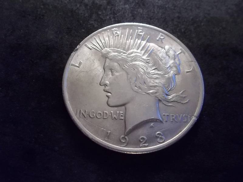 lot 50 image: 1923 Peace Silver Dollar