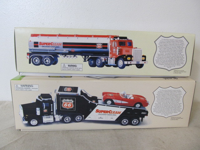 lot 58 image: Pair of MINT IN BOX Diecast Phillips 66 Semi Trucks