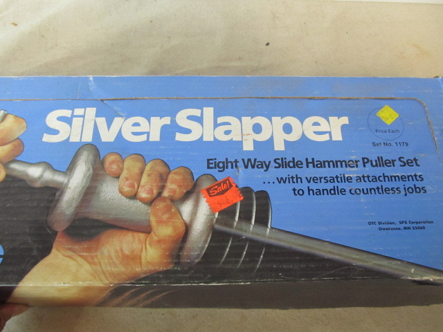 lot 79 image: Silver Slapper 8-Way Hammer Puller Set