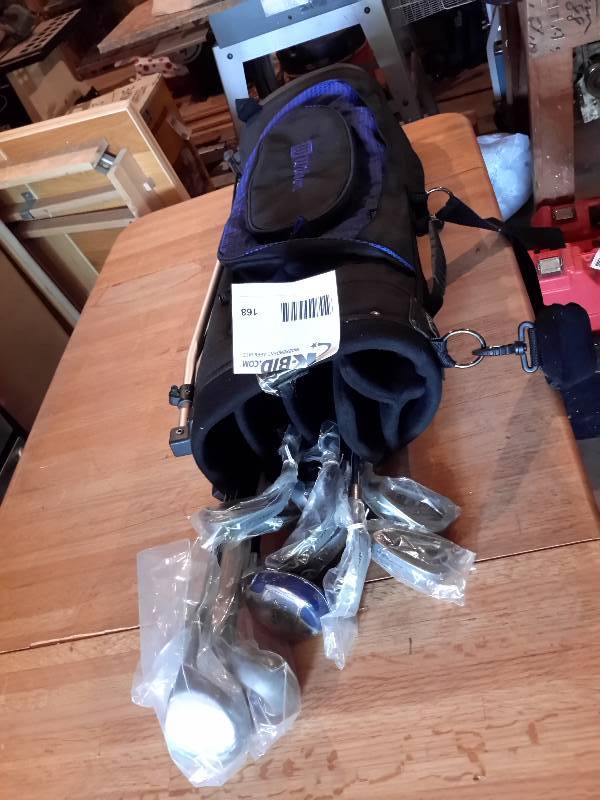 lot 168 image: Set of RED MAX Golf Clubs.. NEW.. Never used. Still in plastic