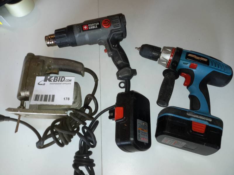 lot 178 image: Heat gun, Cordless Drill and extra battery.. No charger and both batteries are dead so couldnt test.. Jig Saw