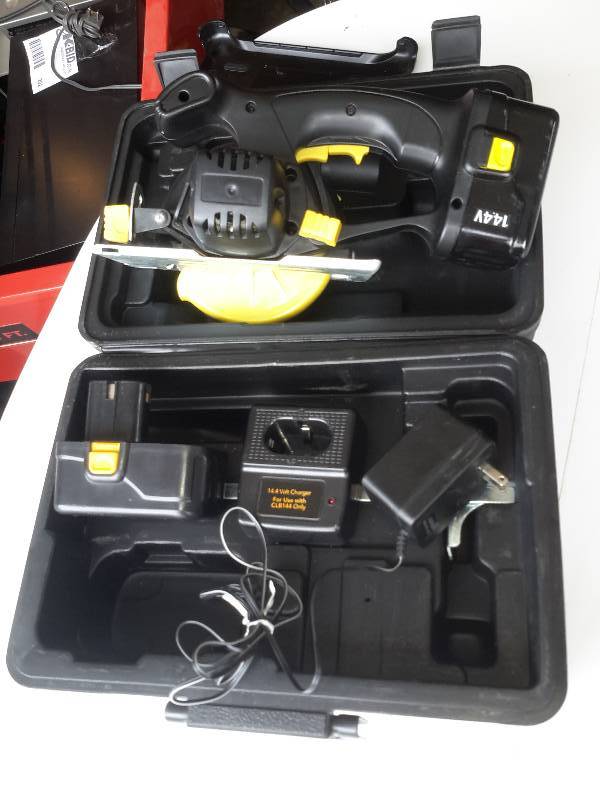 lot 191 image: Power to Go, 14.4 V portable Saw.  Battery Dead so untested