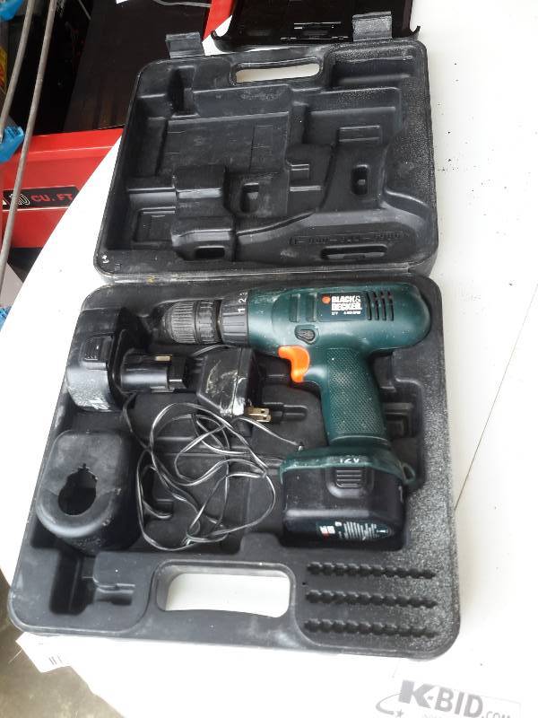 lot 215 image: Black and Decker, 12V Cordless Drill with Extra Battery and charger