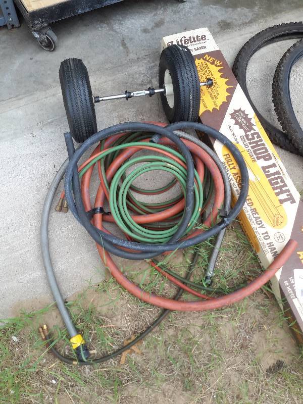 lot 236 image: Misc. hoses, Shop Light, 4 Mountain Bike Tires. SINGLE Trailer Tire