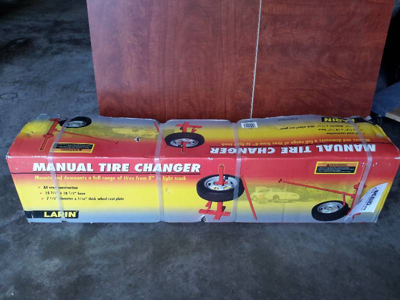 lot 56 image: LARIN, Manual Tire Changer.. New in Box