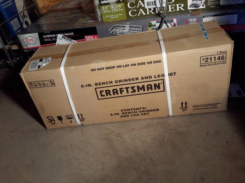 lot 55 image: CRAFTSMAN, 6 in Bench Grinder and Leg Set.. New in Box