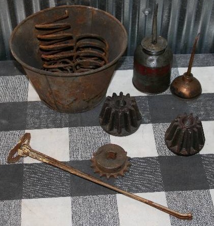 lot 114 image: Vintage Metal Gears, Springs, and Oil Cans