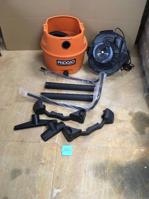 lot 22 image: Ridgid 16 Gal. 6.5-Peak HP Wet Dry Vac with cart in like new condition Model WD1851