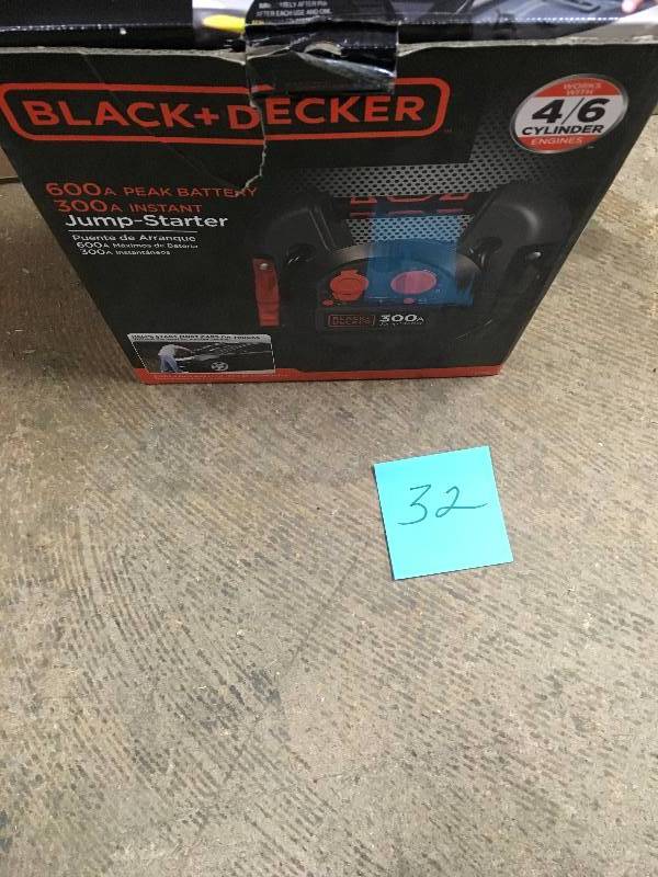 lot 32 image: Black and Decker 300 Amp Portable Jump Starter not used like new open box