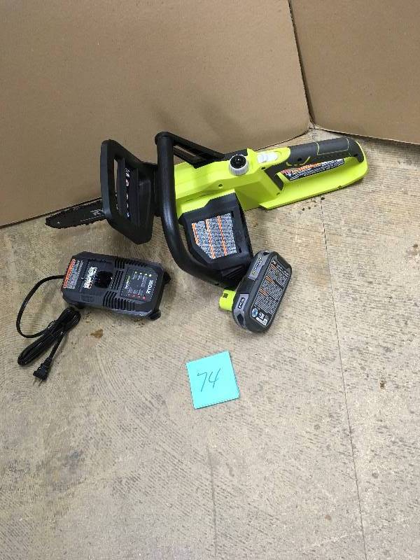 lot 74 image: Ryobi ONE Lithium 10 in. 18-Volt Lithium-Ion Cordless Chainsaw - 1.5 Ah Battery and Charger Included not used