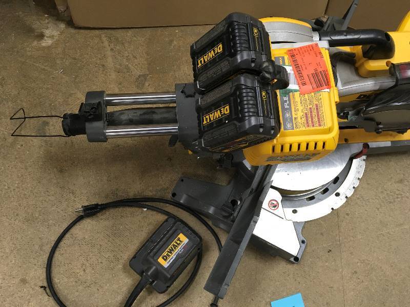 lot 78 image: DeWalt FLEXVOLT 120-Volt MAX Lithium-Ion Cordless Brushless 12 in. Sliding Miter Saw w AC Adapter, Batteries 2Ah and Charger good condition