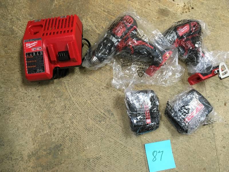 lot 87 image: Milwaukee M18 18-Volt Lithium-Ion Cordless drill driver and impact driver in like new condition