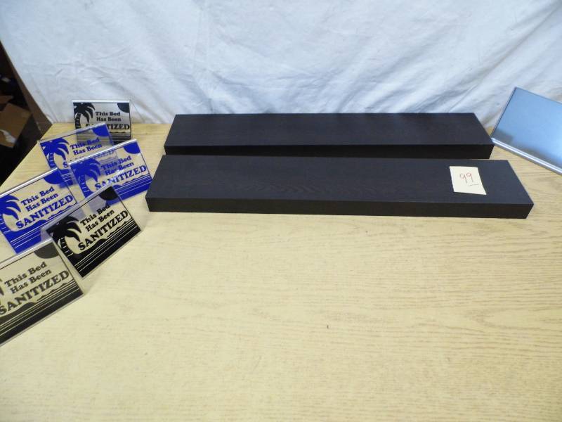 lot 99 image: Floating Shelves - Tanning Signs