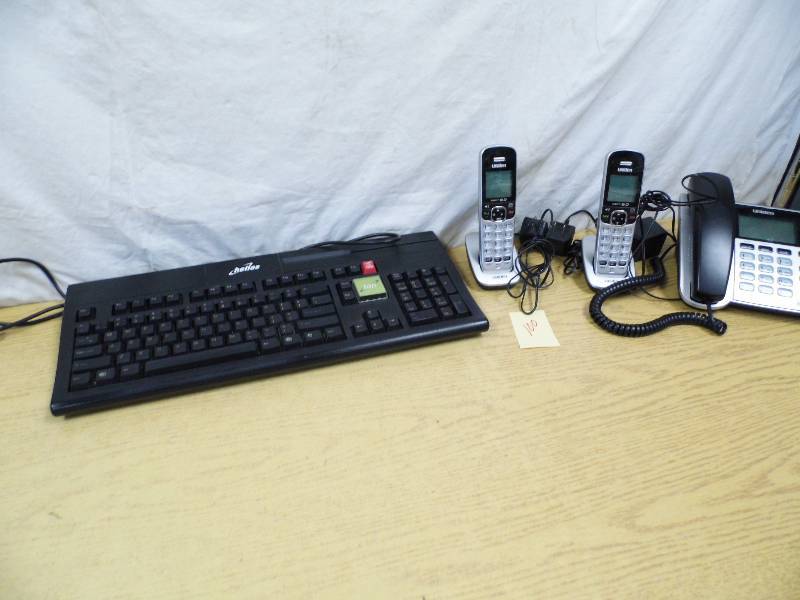 lot 100 image: Phone System - Keyboard