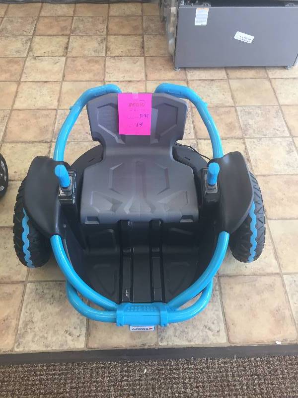 lot 19 image: New Power Wheels Wild Thing 12V Battery-Powered Ride On, Blue