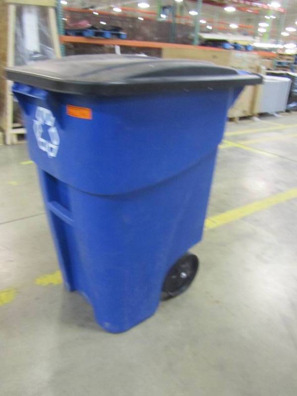 lot 70 image: Rubbermaid Brute 50 Gal. Blue Rollout Recycling Trash Container with Lid