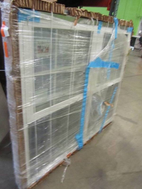 lot 99 image: Andersen 60 in. x 50 in. White Trim Window
