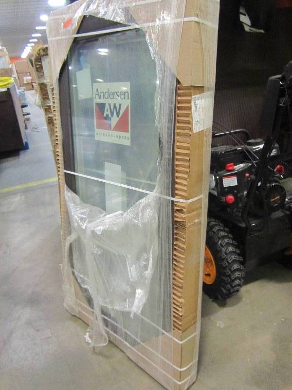 lot 100 image: Andersen 26.5 in. x 51.5 in. Black Trim Window