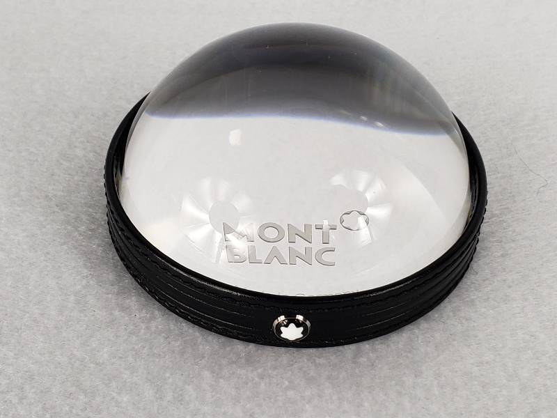 lot 26 image: Montblanc Crystal Paperweight in Black Leather