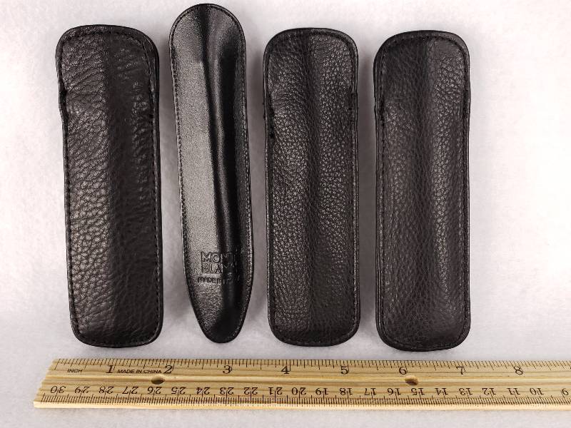 lot 38 image: (6) Montblanc, etc Black Leather Single Pen Cases