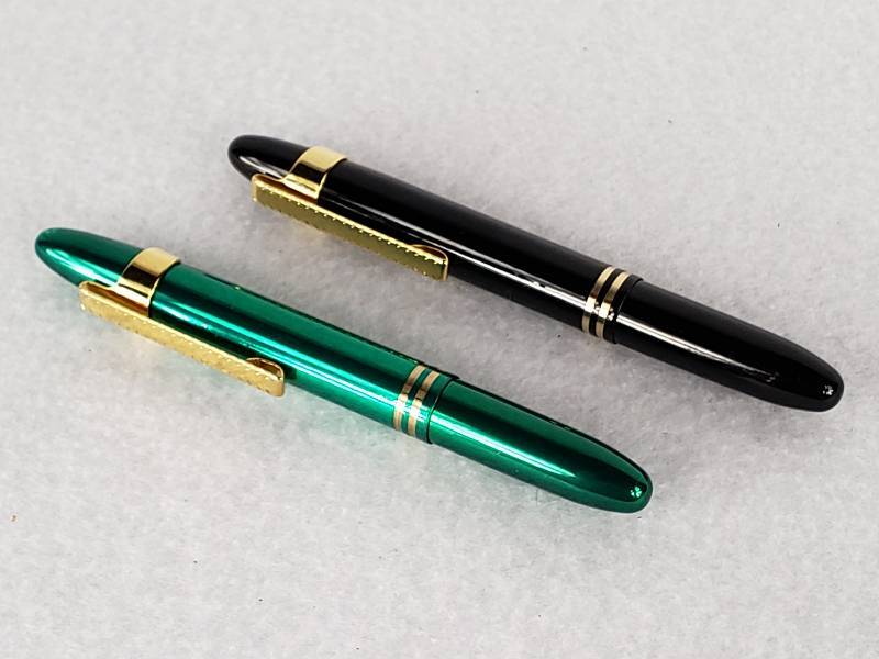 lot 73 image: (2) Fischer Space Pens - Collectible